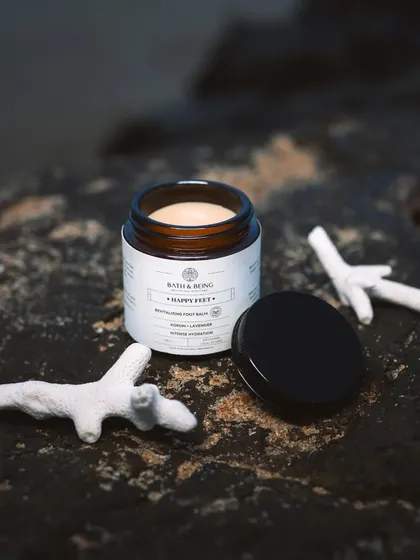 Another shot of our Happy Feet Foot Salve. The rich blend of butters and oils seals in hydration to soften skin overnight.