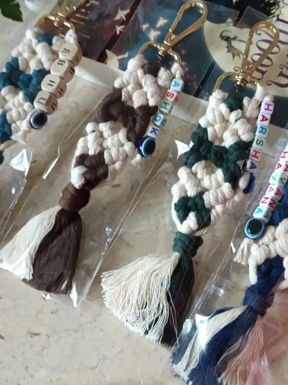 I really enjoy making these custom name keychains. This batch shows how I can mix and match colors to create unique pieces for names like 'Abhay', 'Harsha', and 'Bhavana'.