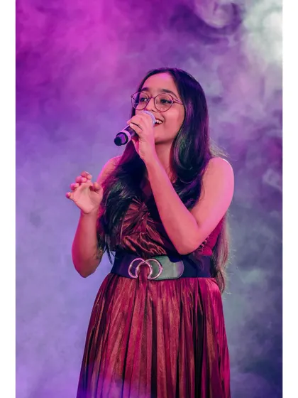 In a world full of noise, I choose to be the melody. A candid shot from a live concert, lost in the music.