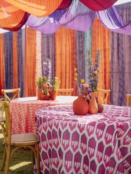 A whimsical "Saturday Market" themed event in Udaipur, with custom-designed stalls for a Chai House, Frozen Yoghurt, and Ice Gola, complete with unique branding and playful decor.