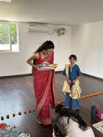 Sharing blessings and sweets during our Vijayadashami celebration. It's these moments of community and connection that make the studio feel like a second home.