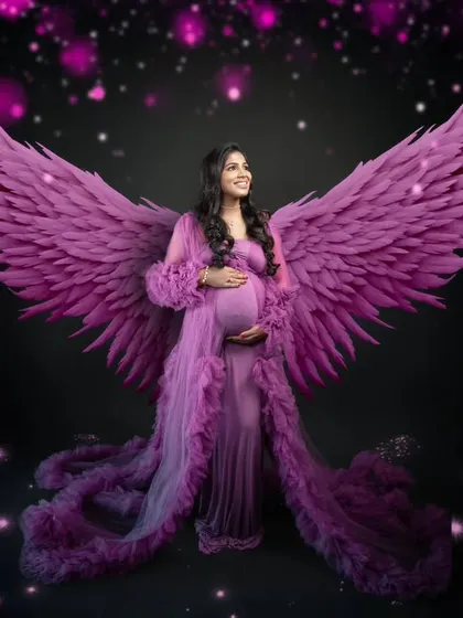 This is our signature shot, with a new creative twist. The grand wings and flowing gown make this moment feel nothing less than heavenly.
