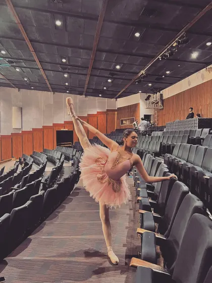 A stunning pose in the auditorium. We use every part of the theater as our creative playground during show week.