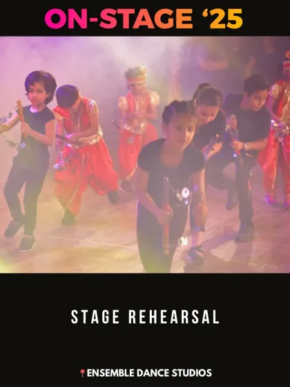 A smoky, atmospheric stage rehearsal. We use elements like smoke machines to create a professional concert feel for our students.
