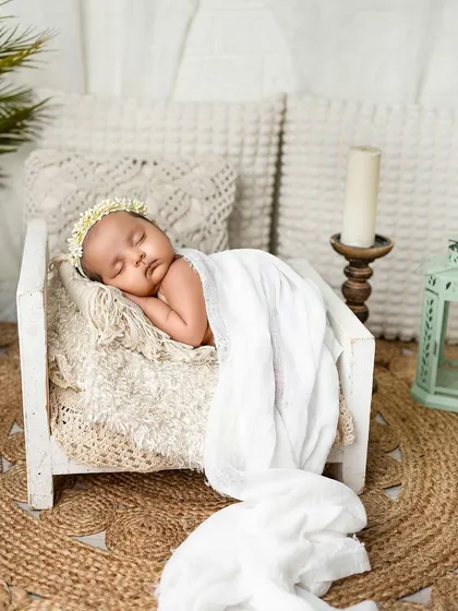 To the most beautiful little girl. This portrait showcases my love for clean, bright, and airy setups with natural textures like jute and soft white fabrics.