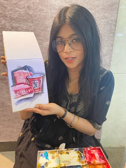 Here I am with my quick watercolor sketch of a KFC meal. It's fun to document these little moments of life with my sketchbook and paints.