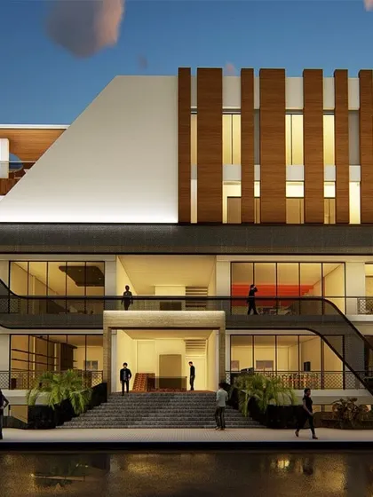 An alternate render of the out-station commercial project, highlighting the building's dynamic form and how it interacts with its environment at dusk.
