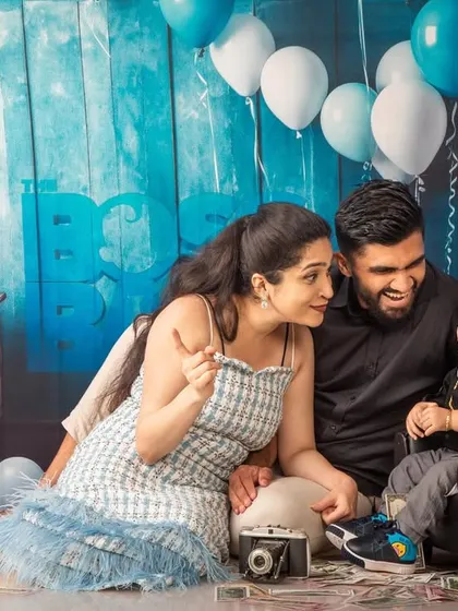 A candid family moment during the 'Boss Baby' themed shoot. I always aim to capture these unposed interactions between parents and their child, as they show genuine emotion and connection.