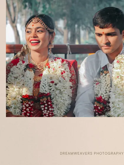 A candid portrait of the bride and groom during their South Indian wedding. The image captures a mix of emotions, from the bride's joyful smile to the groom's thoughtful expression, telling a real story.