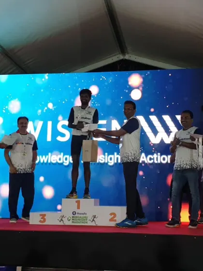 A duplicate of media 107, another shot of our champion on the podium. We celebrate every individual achievement.