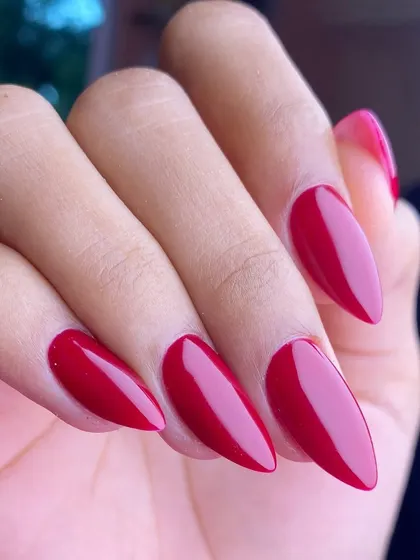 You can never go wrong with a classic red. This set shows perfectly shaped, long almond extensions with a vibrant, glossy red polish for a timelessly chic and confident look.