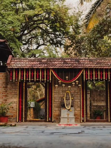The entrance to a wedding at The Tamarind Tree, where our decor complements the venue's rustic and traditional charm.