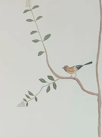 A duplicate image of the small yellow bird.