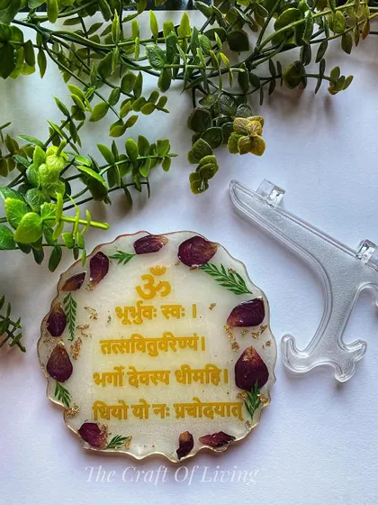 A beautiful Gayatri Mantra plate made with preserved rose petals and leaves. The sacred Sanskrit prayer is written in a clear, elegant script, making it a perfect item for a home altar or as a spiritual gift.
