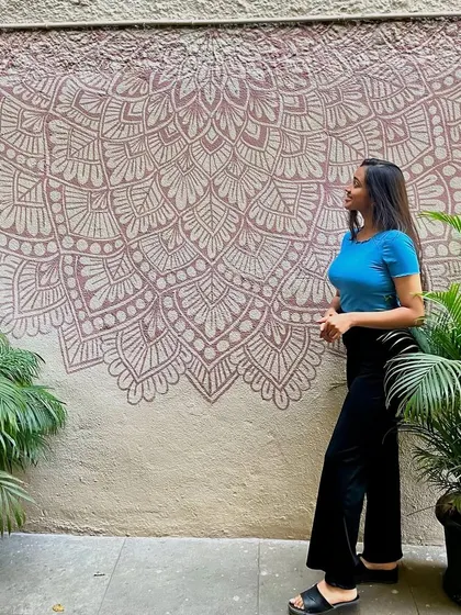 Here I am with the finished mandala mural I created for Cafe Brewing Italiana. This 9 foot wide piece was completed in just 7 hours and adds a rustic charm to their outdoor seating area.