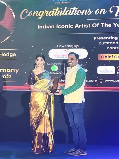 Receiving the 'Indian Iconic Artist of The Year' award. This was a proud moment, not just for me, but for the art of sand storytelling.