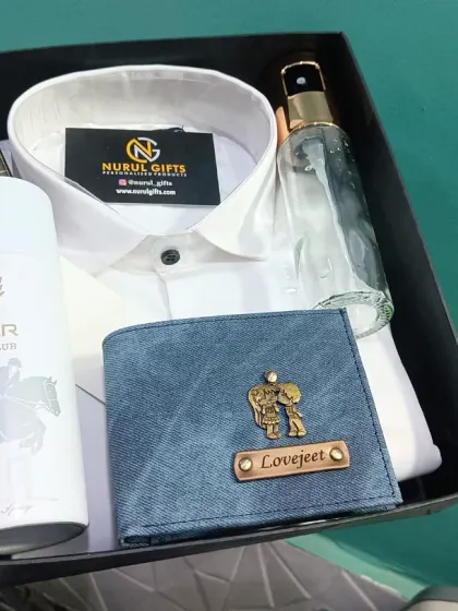 A closer look at the summer gift hamper, showcasing the personalized denim wallet, name-engraved pen, and other curated items.