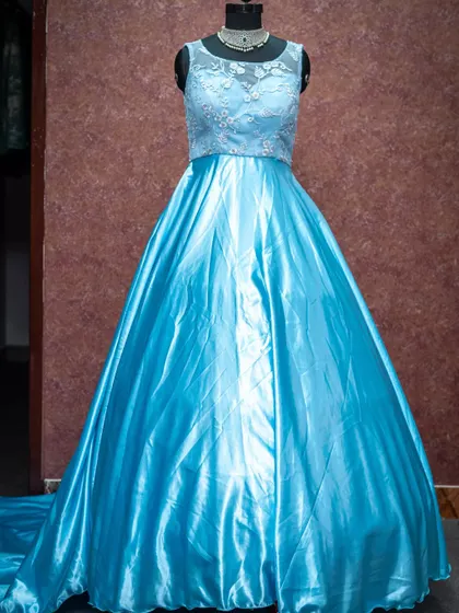 A dreamy sky-blue gown with a delicate lace bodice.