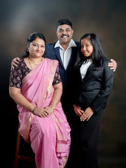 A family portrait showcasing a mix of traditional and formal wear. Our studio lighting is designed to beautifully render different fabrics and colors.