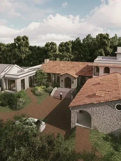 An aerial render of "The Abbey House," showing how the different parts of the home are nestled into the landscape, creating a cohesive yet varied architectural composition.