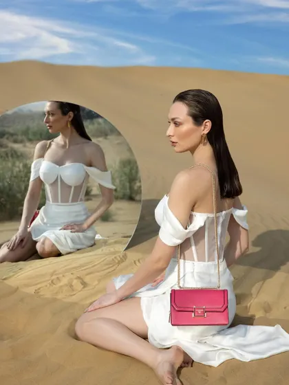 For this high-fashion campaign, I styled a white corset dress with a vibrant pink handbag in the desert. This shows my ability to create striking visual stories for brands, a skill I bring to my wedding styling.