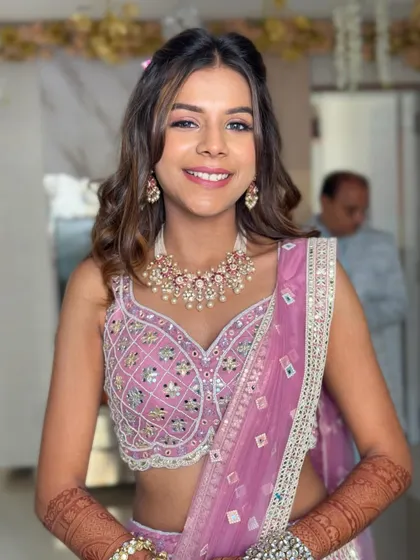 This front view shows the face-framing tendrils and the soft curls that complete this romantic hairstyle.