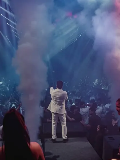 We use special effects to punctuate key moments. Here, CO2 cannons erupt as Mika Singh commands the stage, adding a burst of energy to his club performance.