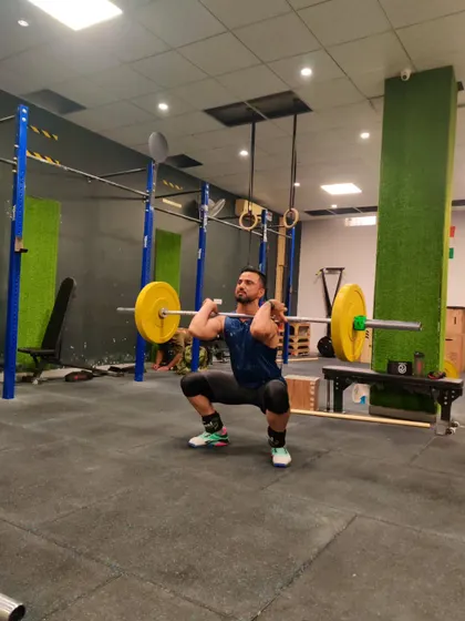 A person becomes great not by birth, but by their actions. A front squat, a foundational movement for building strength and stability.