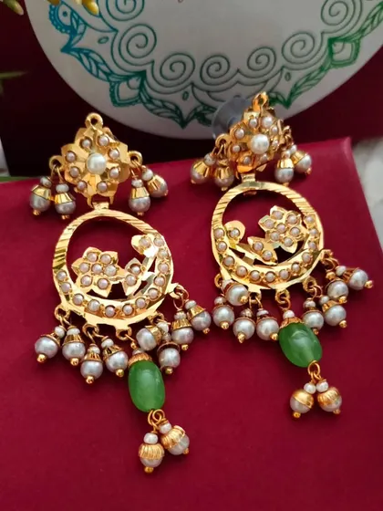 The earrings from the circular pendant set. They are lightweight and perfect for wearing on their own as well.