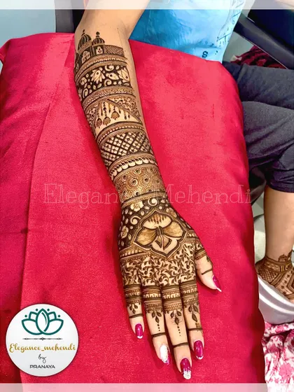 A full bridal backhand design with intricate bands of patterns extending up the arm.