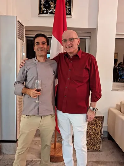 Chef Christophe with the Swiss Consul General after a successful wine and food pairing event. On the same night, our team was also catering the 750-pax Belgian King's Day, showcasing our capacity for handling multiple large events.