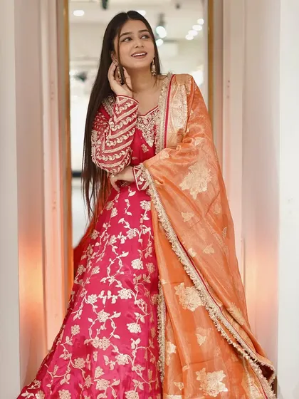 Get ready to slay this festive season in this beautiful pink and orange Anarkali.