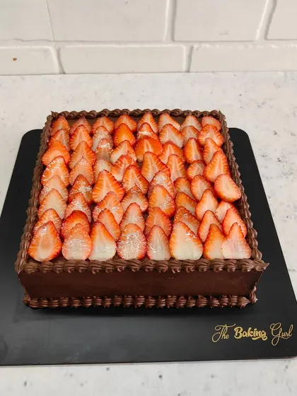 A full view of the Chocolate Strawberry sheet cake, ready for a party. The neat rows of fresh strawberries make it look as good as it tastes.