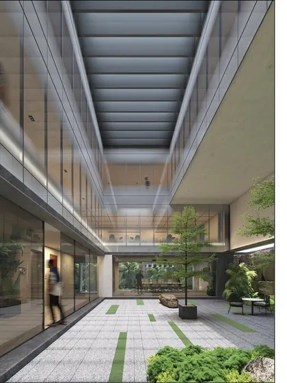 A rendering of an upcoming office block, showcasing a light-filled central atrium. This space acts as the social heart of the building, connecting different floors and departments.