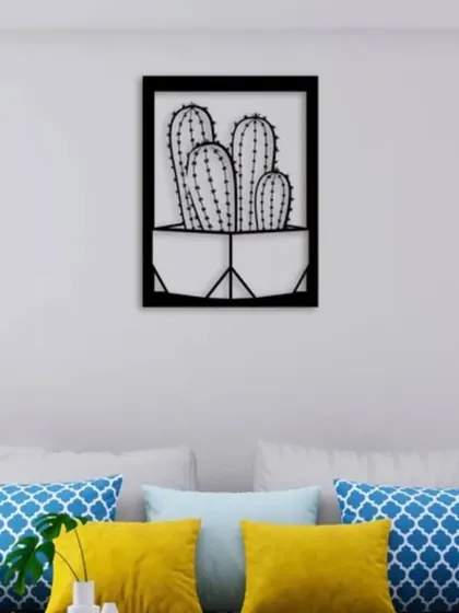 A modern and minimalist take on botanical art, this piece features a potted cactus in a clean, black iron frame. It's a quirky and stylish way to add a touch of desert chic to your home decor.