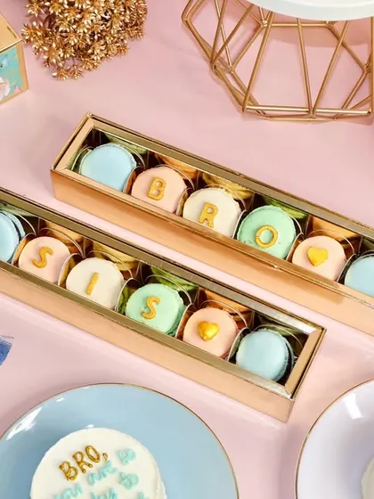 Our "Bro" and "Sis" macaron boxes are the perfect sweet treat for Rakhi. Each box contains a set of our delicious eggless macarons, customized to celebrate your favorite sibling.