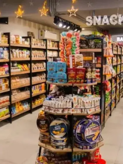 The snacks and baby care sections of the store. The layout is designed to guide customers through the store and encourage discovery of different products.