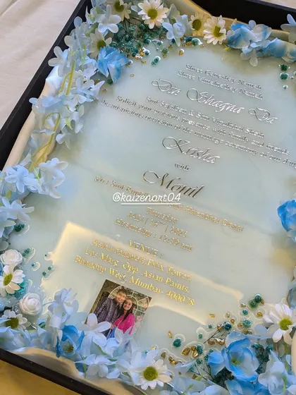 The blue and white resin wedding invitation, a unique and beautiful way to announce a marriage celebration.