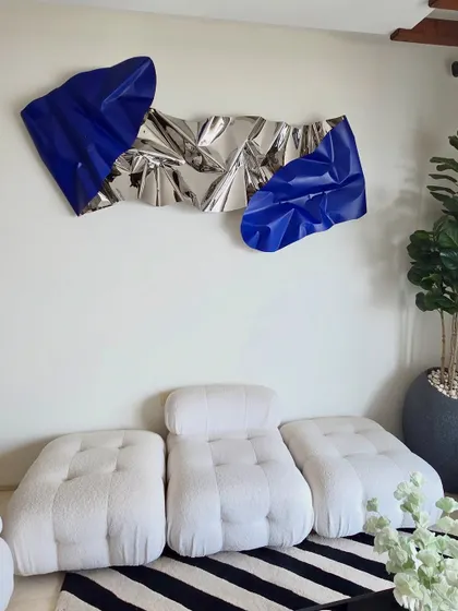Another perspective of the client's living space, showing how the wall sculpture commands attention.
