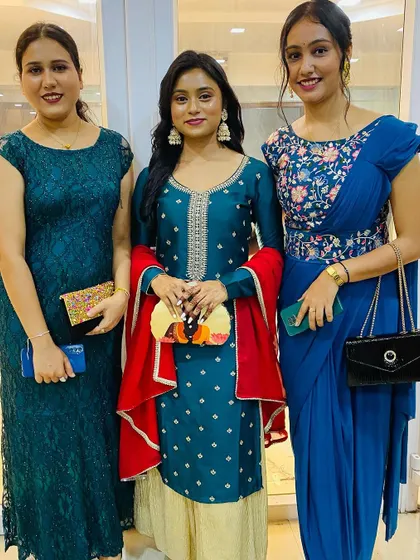 Posing with friends, and our clutch is right there, adding to the style quotient of the entire group.