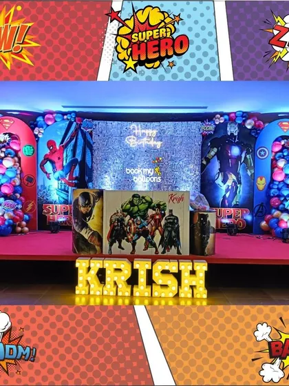 Krish's superhero party was an epic assembly of heroes. The stage decor featured Spider-Man, Superman, and Iron Man against a sparkling backdrop, with the Avengers team front and center on the main table.