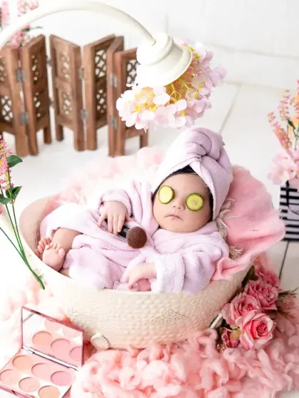 Another angle from the adorable newborn spa session, showing the complete setup with a teddy bear and miniature props. It's all about creating a fun and memorable experience.