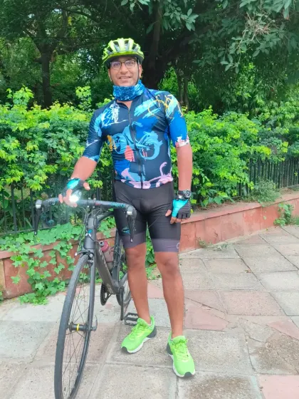 A rider with his sleek road bike, ready for action.