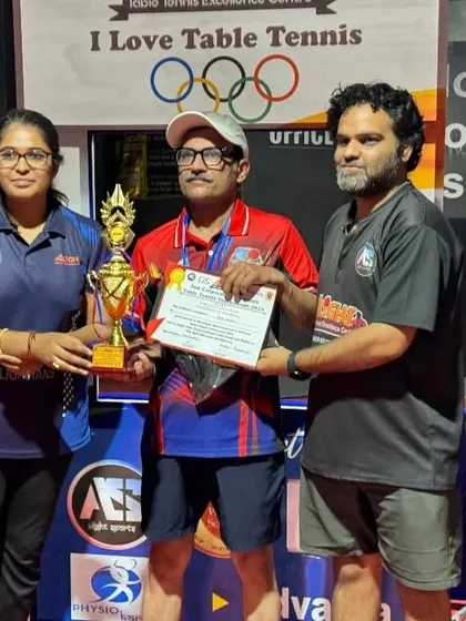 Awarding a trophy to a winner at the Alight Open Corporate & Veterans Tournament. My team and I are always there to manage the event and celebrate with the players.