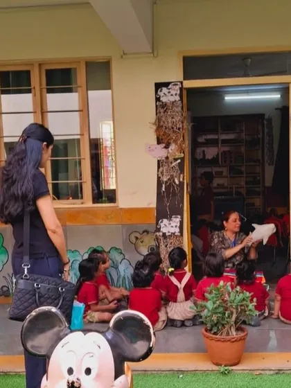 Observing a storytelling session with young learners at a DPS school. Using puppets and expressive narration makes learning engaging and memorable for children.