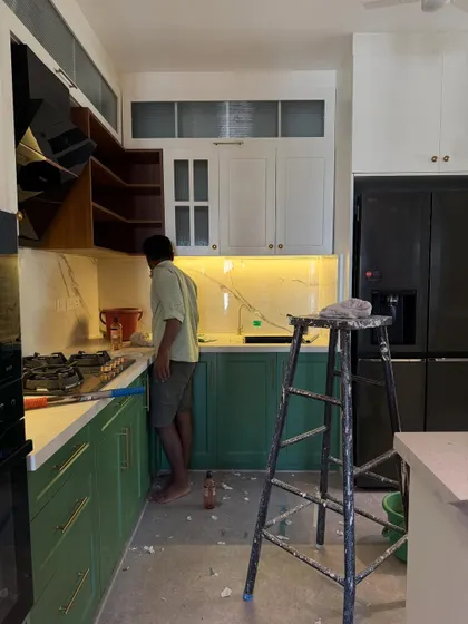 A kitchen in the middle of its glow-up. The cabinets are in, the marble is up, and the appliances are waiting. This is the exciting phase where the space starts to take shape.