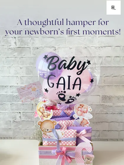 The full view of the "Baby Gaia" hamper, complete with a custom balloon. This shows how I can create a cohesive and adorable theme across all elements of the gift.