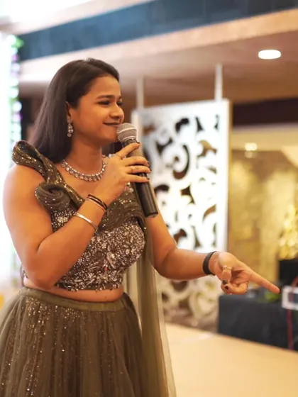 A candid shot of me interacting with guests, featured in the 'Shaadi Express' concept.