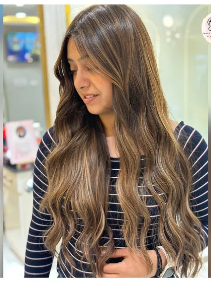 Level up your look with ash brown. These cool, muted tones bring a modern twist to classic brunette, perfect for those craving depth without going too dark.