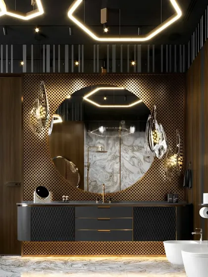 A highly luxurious and artistic bathroom design. The circular mirror, unique light fixtures, and perforated metal screen create a one-of-a-kind look.